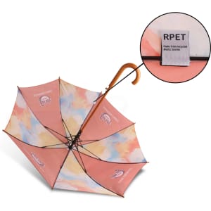 A wooden umbrella with a curved handle, featuring a colourful, patterned canopy and a logo.