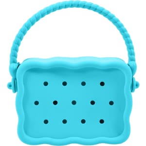A turquoise silicone bag with a textured handle and holes, featuring a scalloped design.