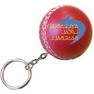A red cricket ball stress reliever with a keyring attachment, featuring a logo design.