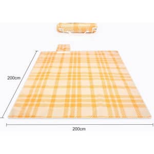 A picnic blanket measuring 200x200 cm, featuring a yellow and cream check pattern, with a rolled handle visible.