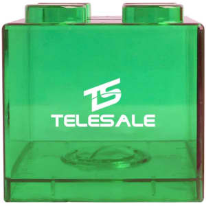 A green square block coin bank with a logo, resembling a classic building block design.