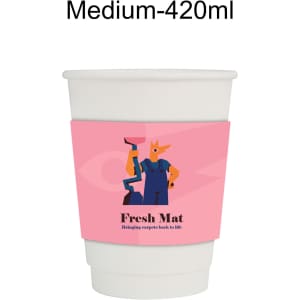 A compostable paper cup with a cup sleeve, featuring a colourful illustration and a pink design.