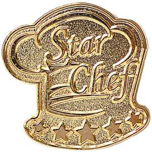A gold lapel pin shaped like a chef's hat with stars and the words "Star Chef".