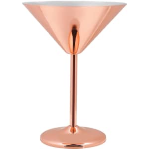 A stainless steel martini goblet with a shiny rose gold finish and a smooth white interior. It has a sturdy base.