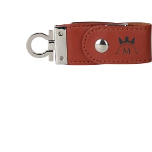 A brown leather flash drive with a silver clasp and an embossed logo on the side.