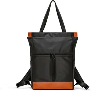 A convertible black nylon backpack with orange accents and adjustable straps, featuring a front zip pocket.