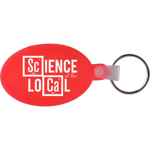 A red oval keyring with a keychain attachment, featuring a logo design.