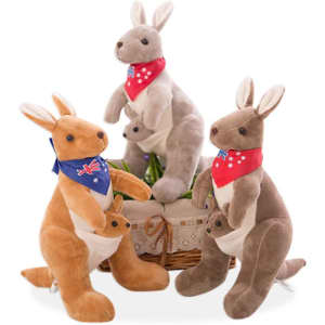 A collection of three plush kangaroo toys in brown and grey, each wearing a bandana, sitting together in a basket.