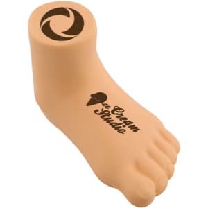 A beige leg-shaped stress reliever featuring a rounded top and a logo.