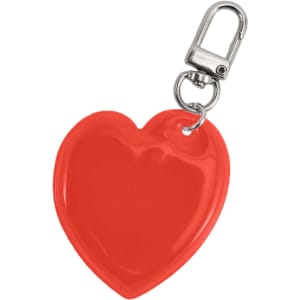 A red heart-shaped reflective keychain with a metal clip. It has a glossy finish and a standard keyring attachment.