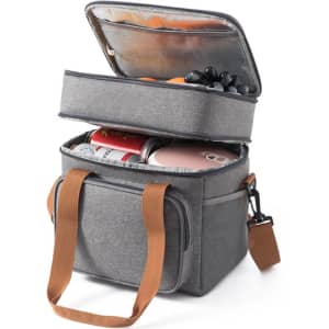 A grey 10L cooler bag with a zipped lid, featuring compartments filled with drinks and fruit. It has a logo and shoulder strap.