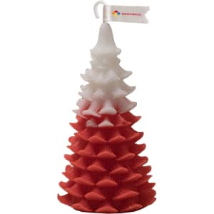 A Christmas tree shape candle in red and white, featuring a textured design and a small flag with a logo.
