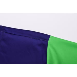 A close-up of a unisex long sleeve shirt featuring a navy blue and green design, with visible stitching details.