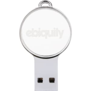 A mini round crystal flash drive in silver and white, featuring a logo on the crystal surface.