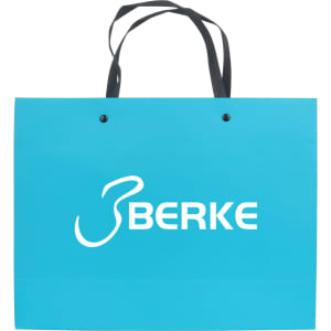 A turquoise knitted handle bag with a laminated finish and a logo. It features two black handles.