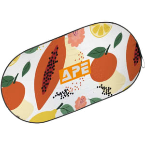 A reflective car sunshade with a vibrant fruit and floral pattern, featuring a logo in the centre.
