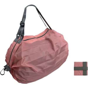 A foldable shopping shoulder bag in a soft pink shade, with a grey strap and an included compact storage pouch.