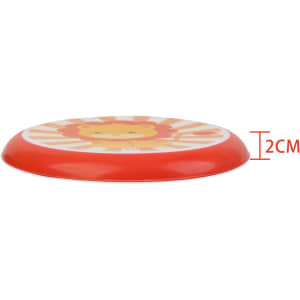 A soft frisbee in red with a lion design on a circular surface, measuring 2 cm in height.