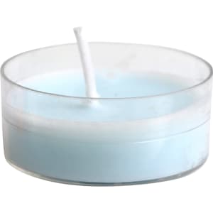 A tealight candle in a clear container, featuring a light blue wax and a white wick.