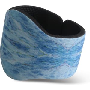 A drink bottle holder in a custom blue wave pattern with a black interior and branding.