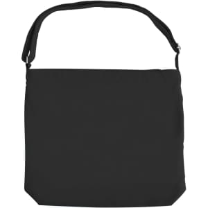 A black canvas tote bag with a long strap, featuring a simple design and a branding logo.