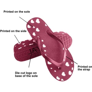 Maroon thongs featuring heart patterns, with a die-cut logo on the sole and printed details on the side and strap.