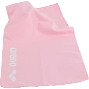 A pink quick dry towel with a logo, featuring a smooth texture and lightweight design.