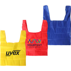 Three reusable foldaway shopping bags in yellow, red, and blue, featuring various logos and branding.