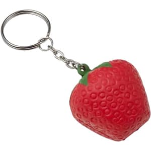 A red strawberry-shaped stress reliever attached to a silver keyring, featuring textured detailing and a green stem.