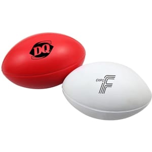 A red and a white stress ball in the shape of a rugby ball, featuring logos on both.