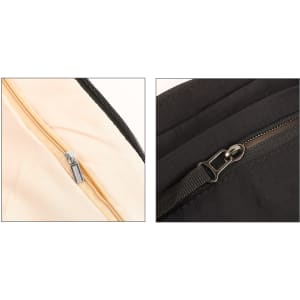 A close-up of two zippers on a lightweight crossbody bag, featuring a beige interior and a black exterior.