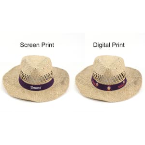 A cowboy straw hat in natural tones with a wide brim and decorative band, featuring logos on the band.