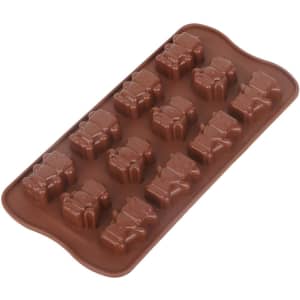 A brown silicone ice cube tray shaped like teddy bears, featuring 14 moulds for ice cubes.