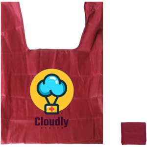 A maroon reusable foldaway shopping bag with a logo featuring a cloud and a medical cross. The bag is compactly folded beside it.