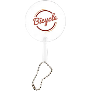 A clear mini PVC hand fan with a circular design and a keychain attachment, featuring a logo in warm colours.