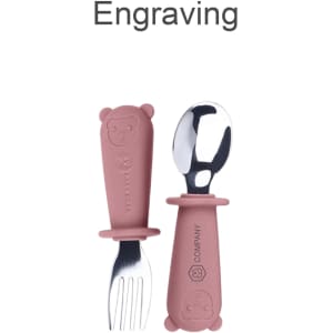 A pink silicone and stainless steel children's fork and spoon set, featuring bear designs on the handles and a logo.