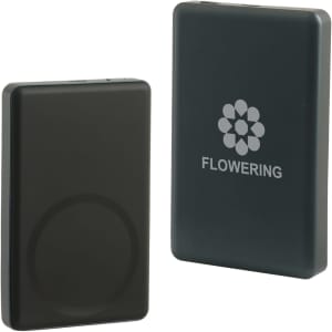 A black aluminium power bank with a circular magnetic area, featuring a logo on one side.
