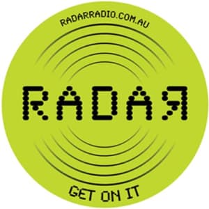 A round green mouse mat featuring a logo with dots and sound wave patterns.