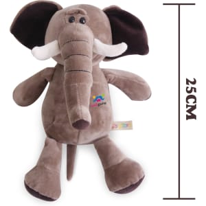 A plush toy elephant in brown and cream, measuring 25 cm, with a stitched logo on its side.