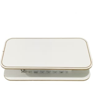 A rectangular backlit LED display with a sleek white surface and gold trim, featuring a branding logo.