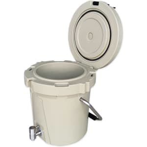 A beige ice bucket with a faucet and a lid, featuring a sturdy handle and a smooth cylindrical design.