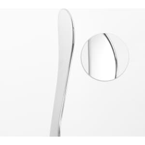 A silver facial Gua Sha massage tool with a sleek, curved design, featuring a close-up of its polished surface.