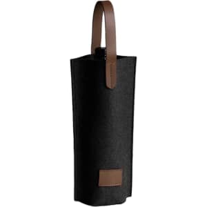 A drink bottle in a black felt wine bag with a brown leather handle and accent.