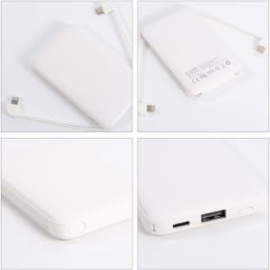 A white 5000mAh power bank with a built-in charging cable, featuring USB ports and a logo on the back.