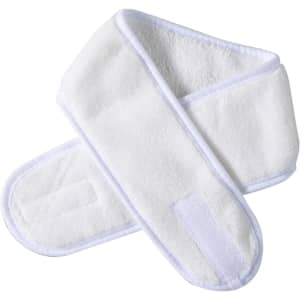 A white promotional headband with a soft texture and a velcro closure. It features a simple design with a logo.
