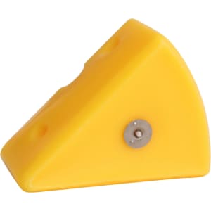 A yellow triangle-shaped candle with small holes, resembling a piece of cheese, features a metal base.