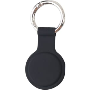 A black Air Tag protective case with a keyring attachment. The case has a smooth, rounded shape.