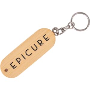 A wooden flash drive with a keychain, featuring a light brown colour and a branding logo.