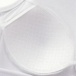 A white seamless wide-strap racerback yoga bra tank featuring a breathable, textured fabric interior and logo detail.