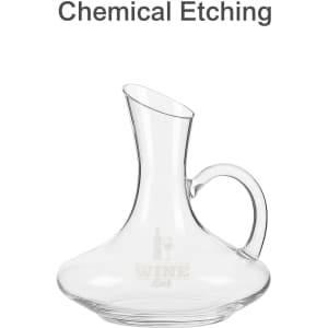 A wine decanter with a curved body and handle, made of clear glass, featuring a seamless design.